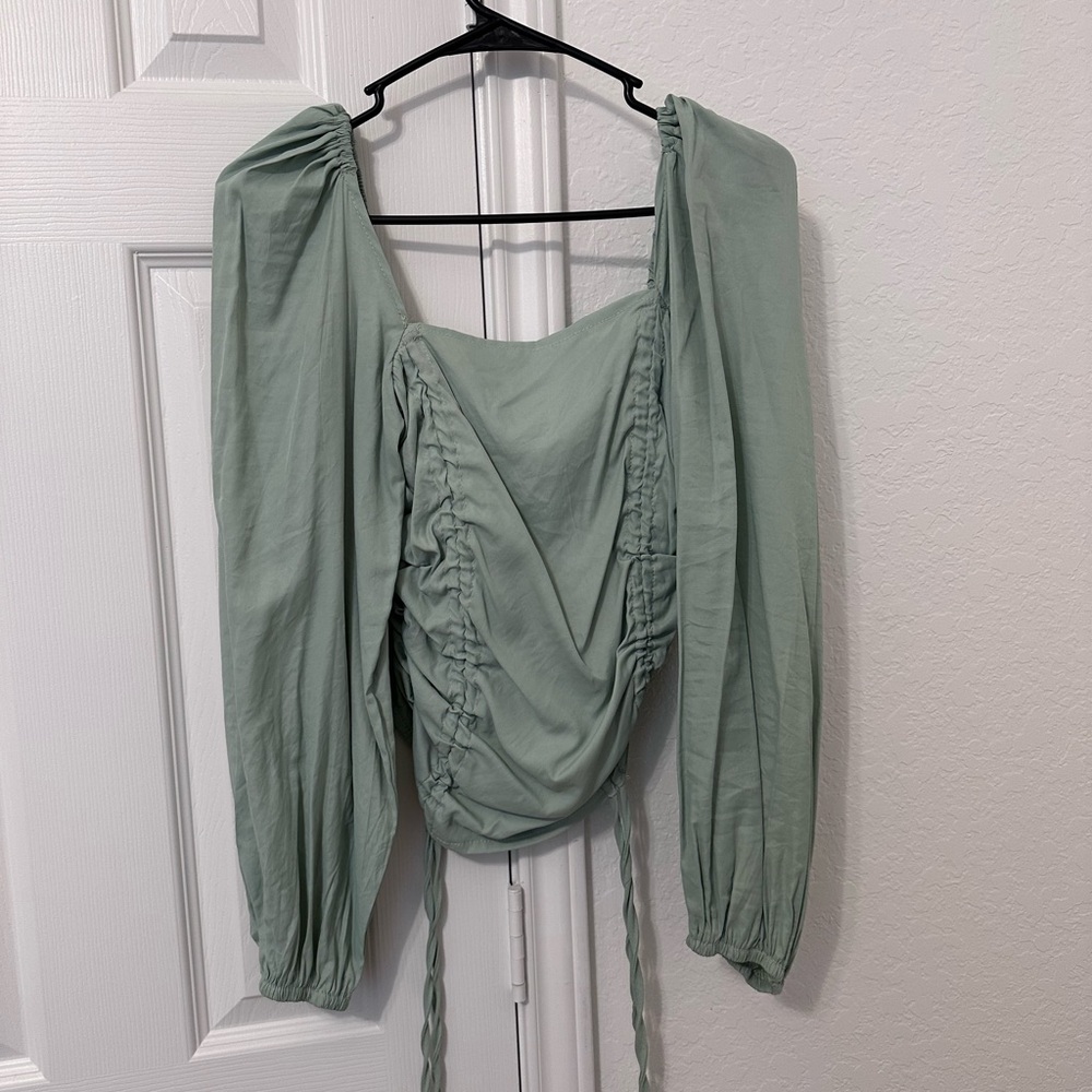 Women blouses 👚 with soft fabric and green color. Size Small